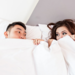 a couple sleeping together