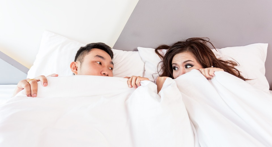 a couple sleeping together